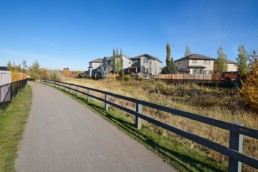 Walking trail along nature area behind homes in Jesperdale in Spruce Grove